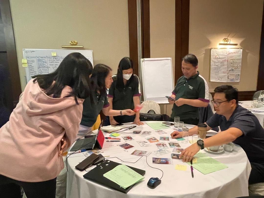 Sarawak Skills participants working together around a futures workshop table